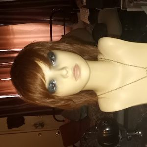 Beautiful Auburn brown 100% human hair wig. NEW WITHOUT TAGS. Cute layered shag.